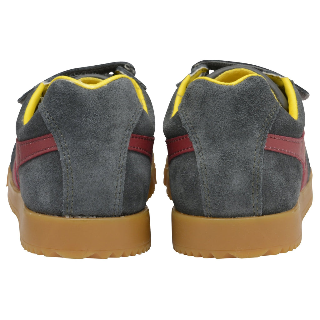 The back view of a pair of gray Gola kids' sneakers with red stripes and yellow lining.