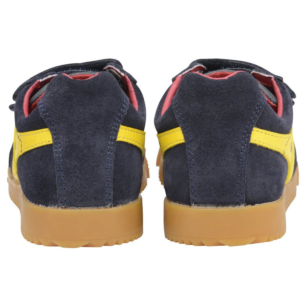 The back view of two navy blue Gola trainers with yellow stripes and brown soles.