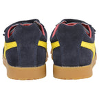 The back view of two navy blue Gola trainers with yellow stripes and brown soles.