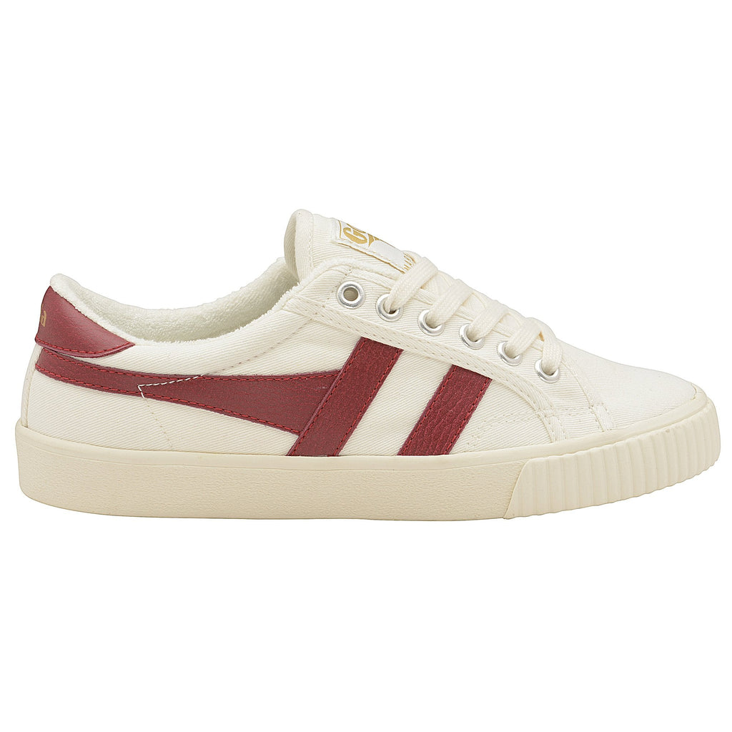 Side profile of a Gola women's low-top sneaker in off-white with two red stripes.