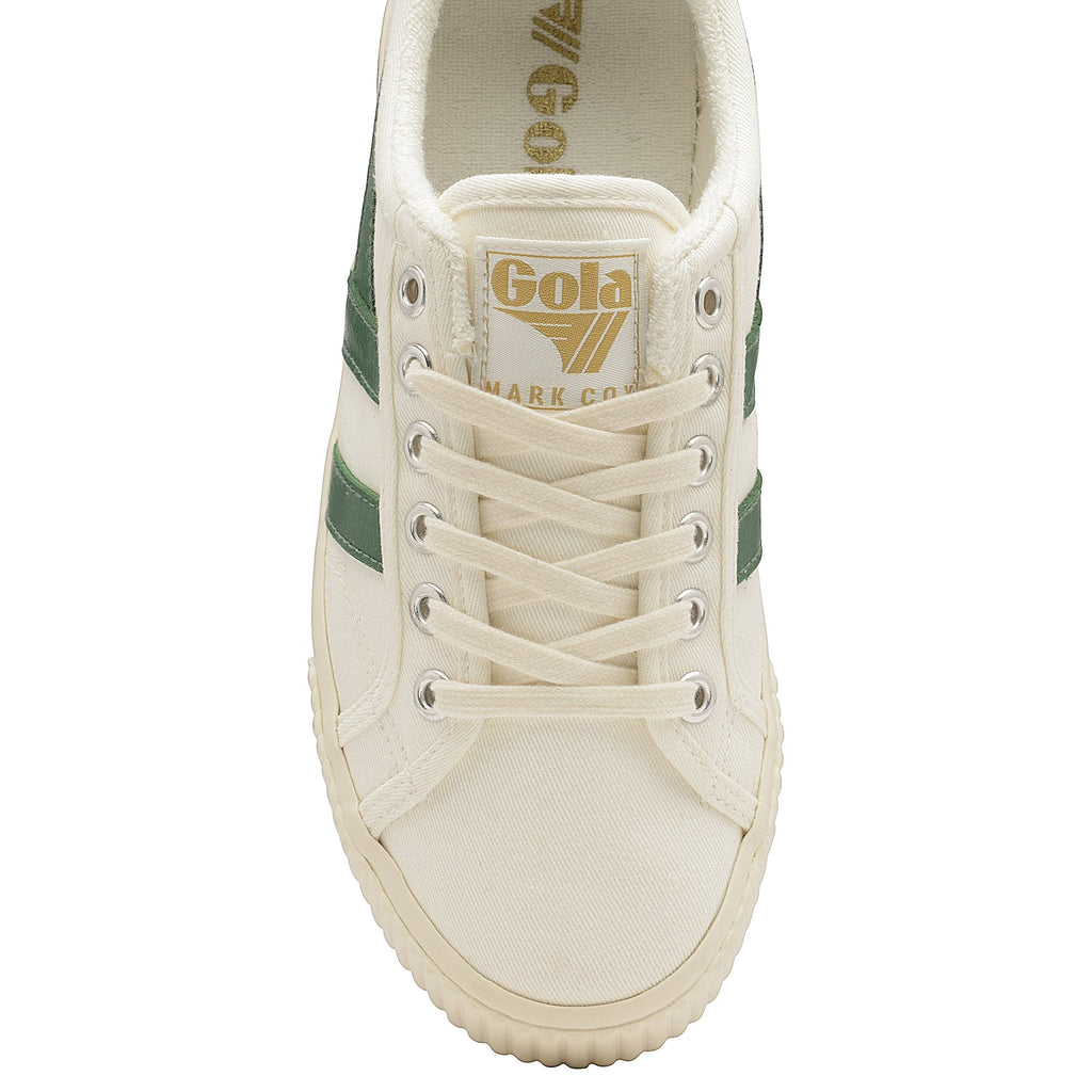 A white and green Gola low-top sneaker, positioned for a top-down view of the front.