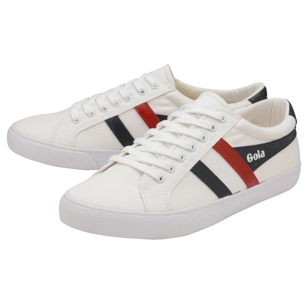 A pair of white Gola sneakers with red and black stripes and black heel tabs.