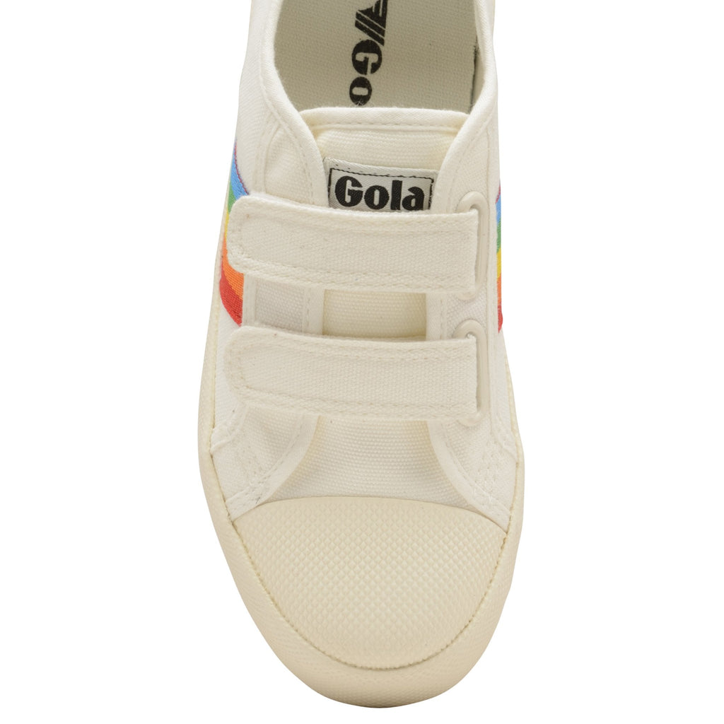 A top-down view of a white Gola sneaker with two white velcro straps.