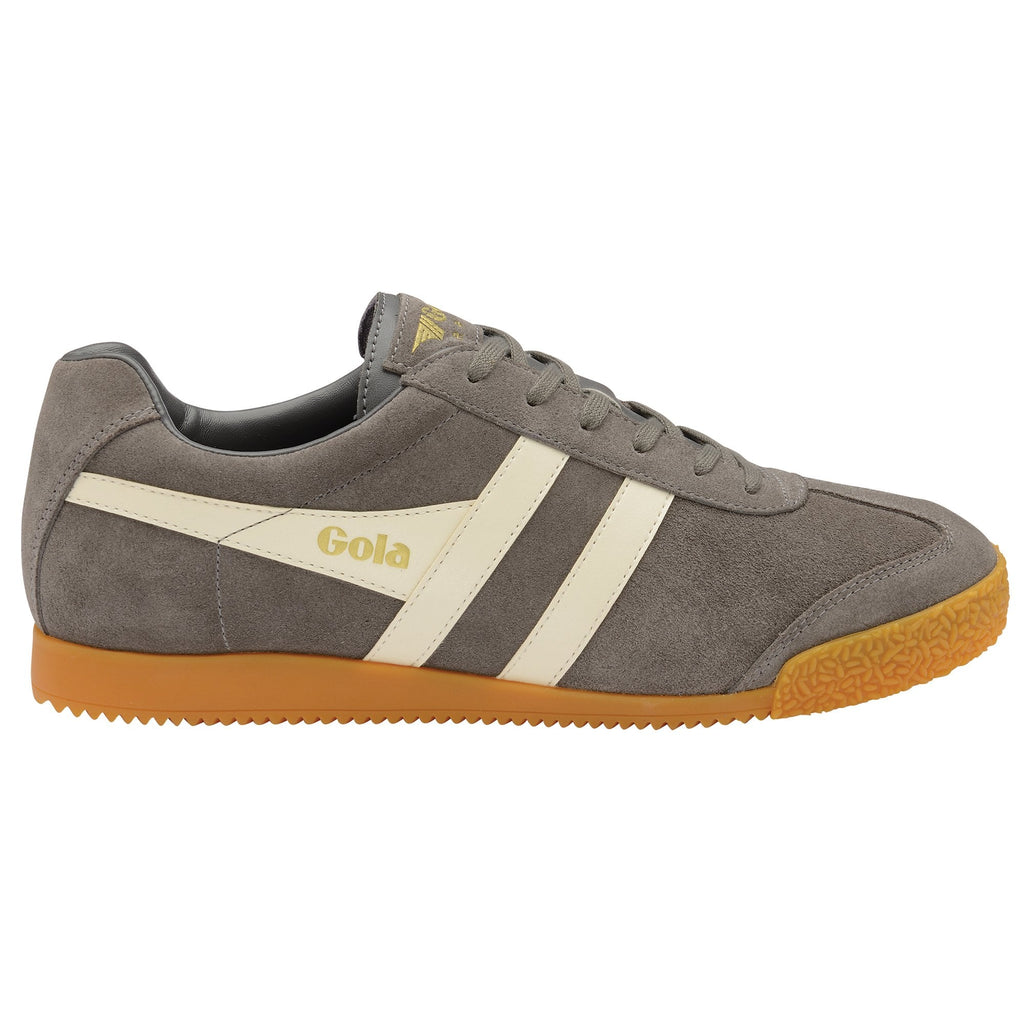 Side profile of a single gray Gola sneaker with white stripes and a gum sole.