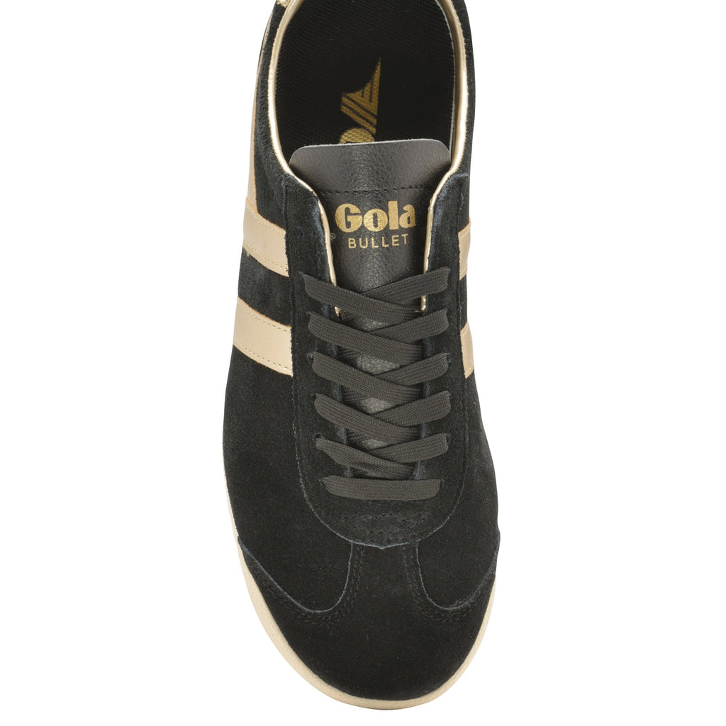 A top-down view of a black suede Gola Bullet sneaker with gold stripes and branding.