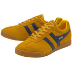 A pair of Gola men's Harrier trainers in sunflower and navy, positioned on a white background.
