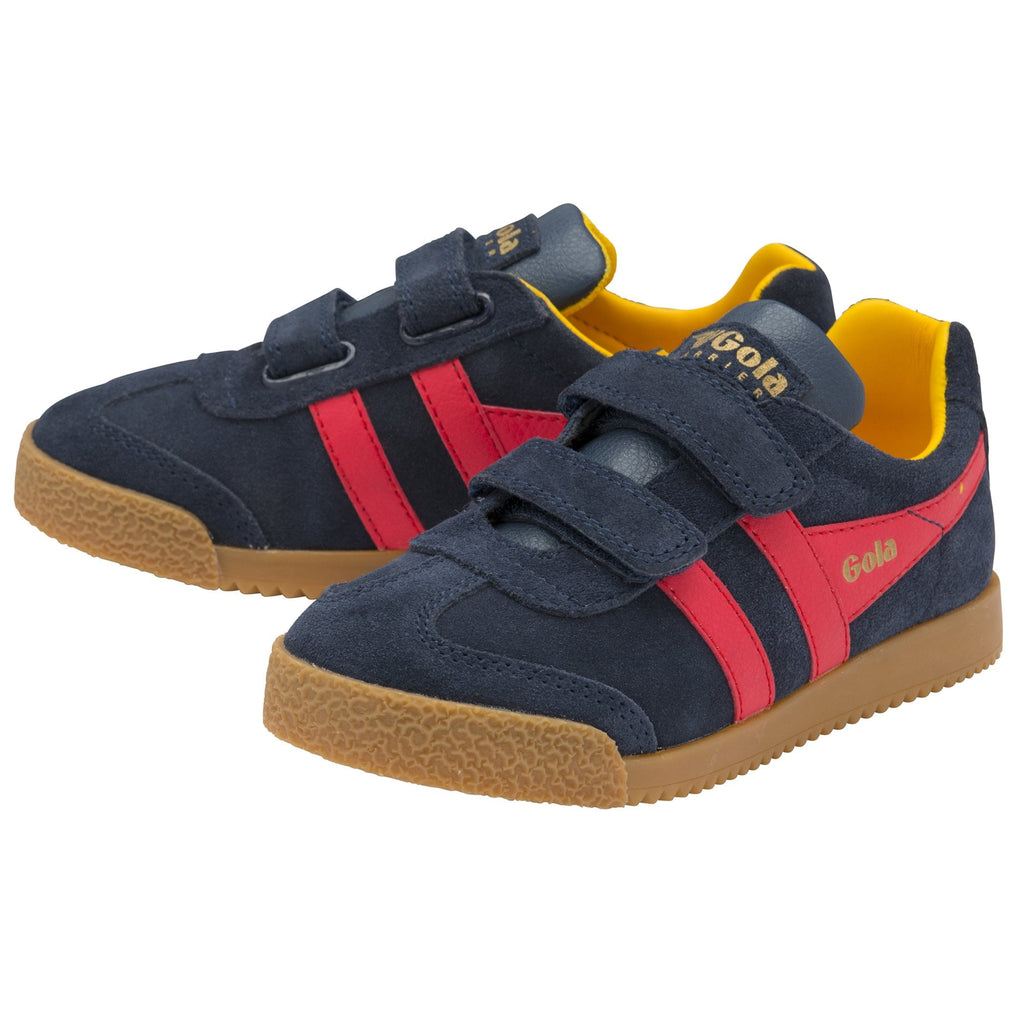 Two navy blue Gola kids' sneakers with red stripes, yellow accents, and hook-and-loop closures.