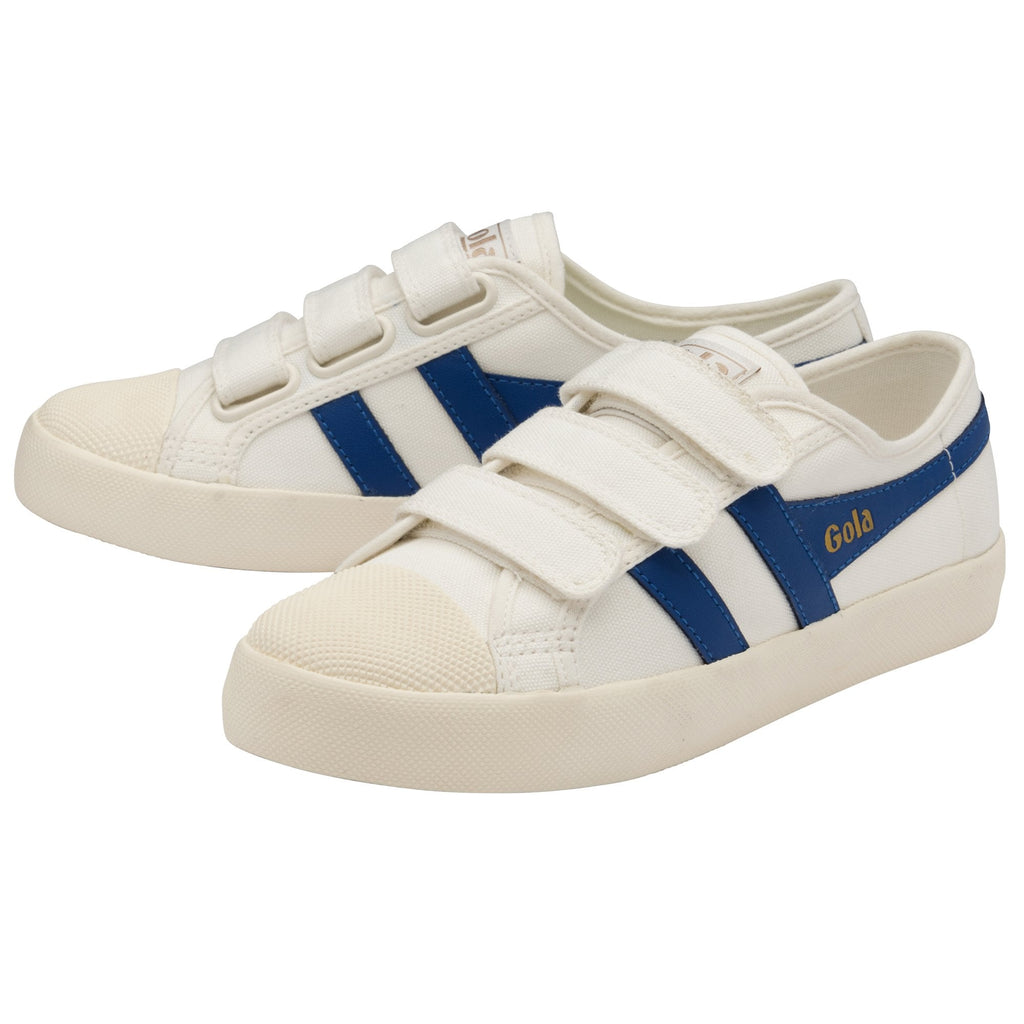 A pair of white Gola sneakers with blue stripes and three Velcro straps each.