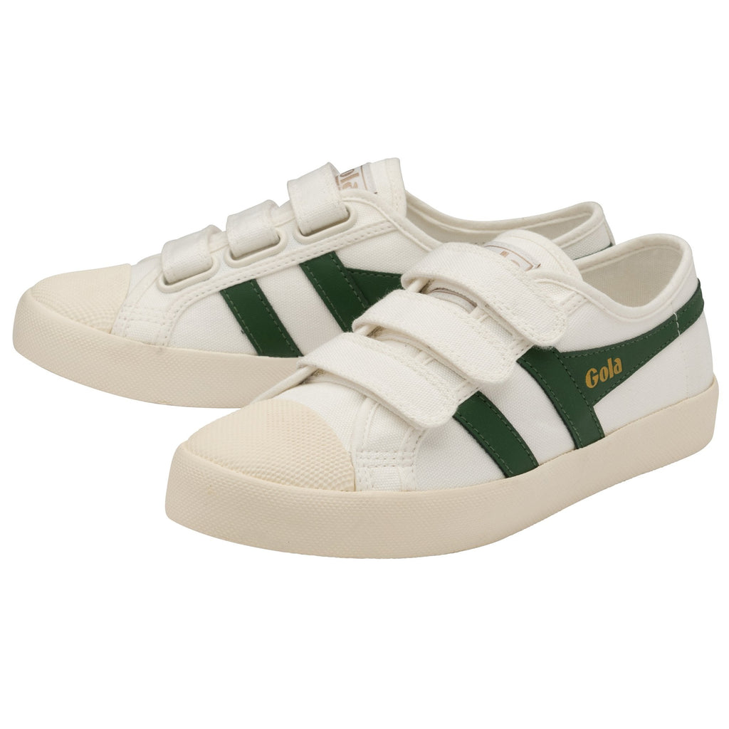 A pair of white Gola sneakers with green stripes and three white hook-and-loop straps.