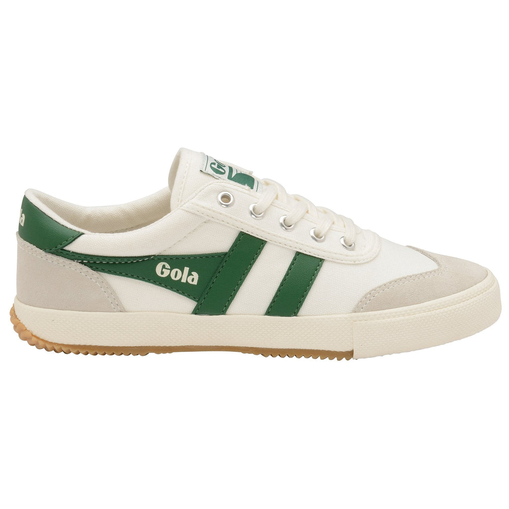 A white Gola sneaker with green stripes, viewed from the side, on a white background.