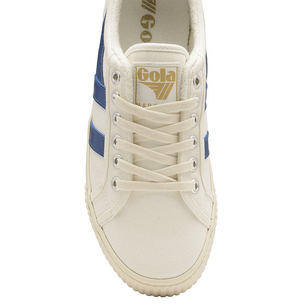 Top-down view of a white sneaker with blue stripes and a gold 'Gola' logo on the tongue.