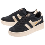 A pair of black suede Gola Orchid Platform sneakers with gold stripes and heels.
