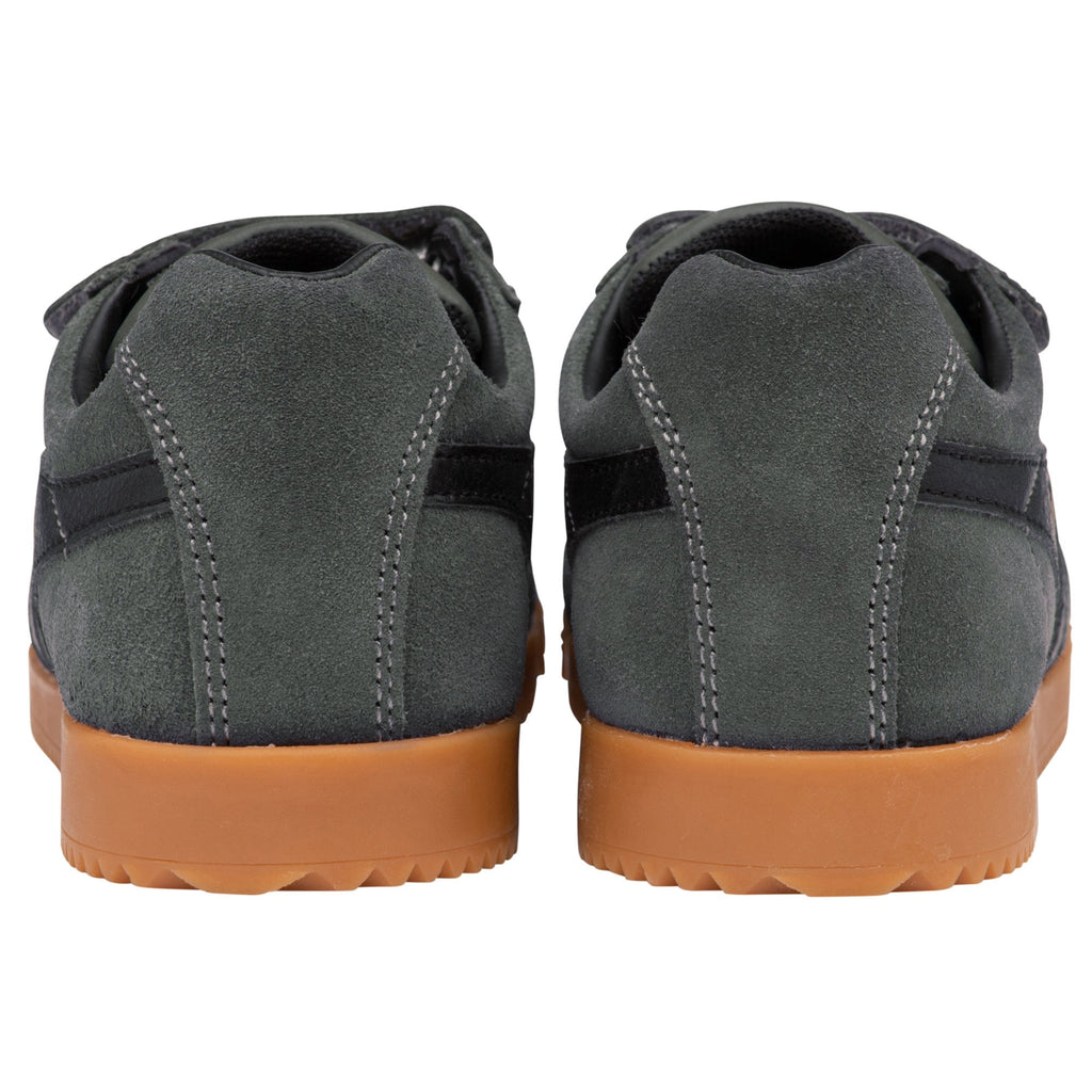 A back view of a pair of gray Gola sneakers with black stripes and tan soles.