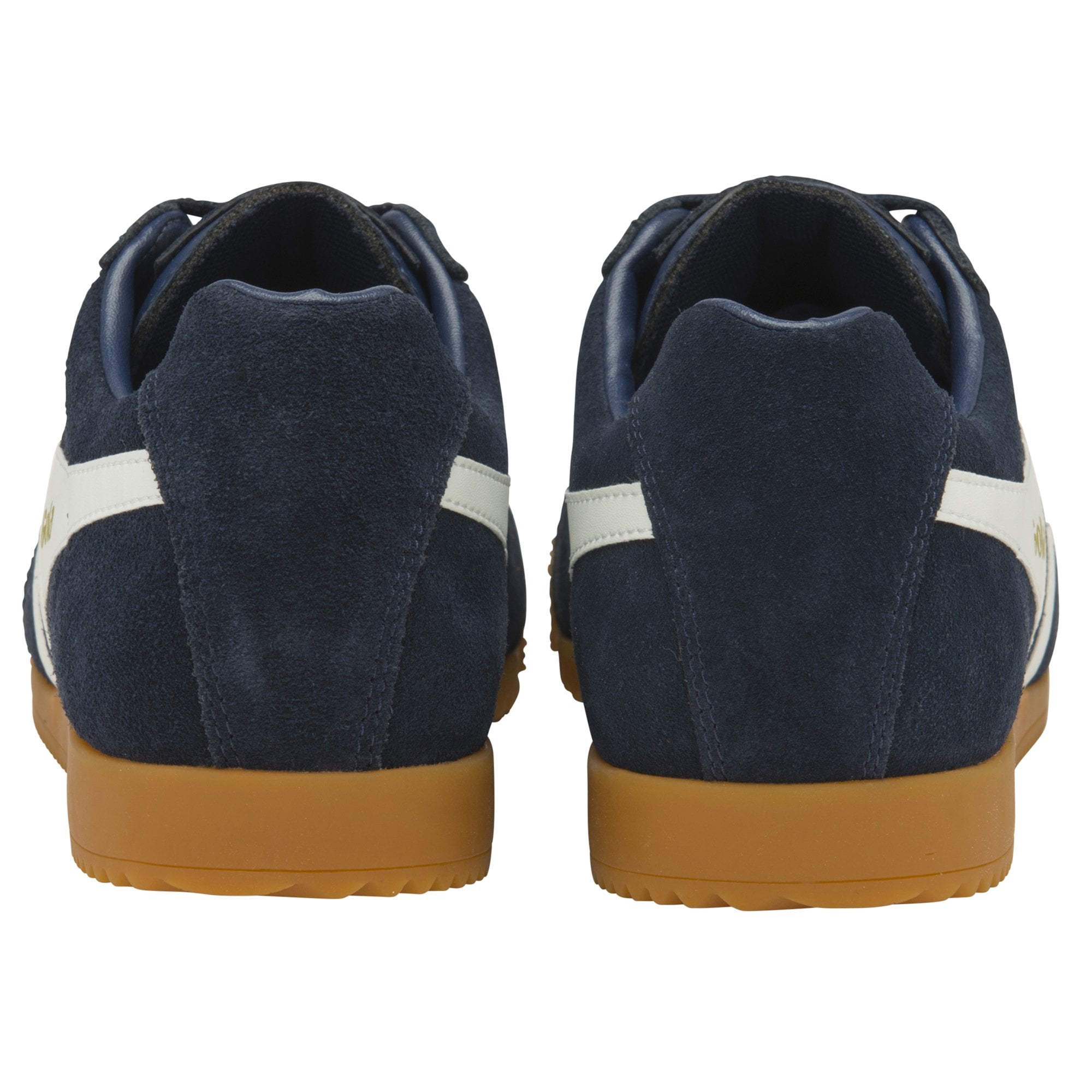 The back view of a pair of navy Gola men's Harrier sneakers with white stripes.