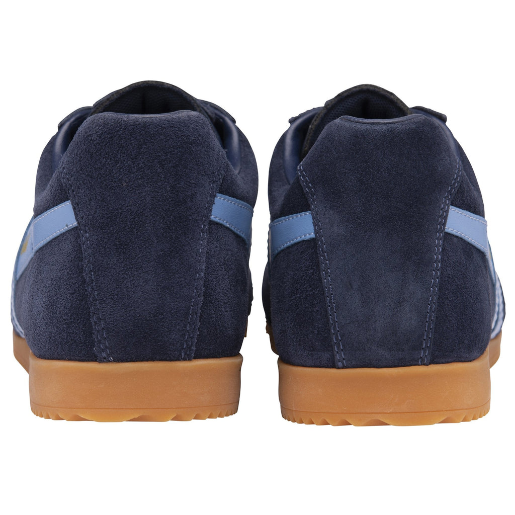 Back view of a pair of Gola Harrier suede sneakers in navy with light blue stripes.