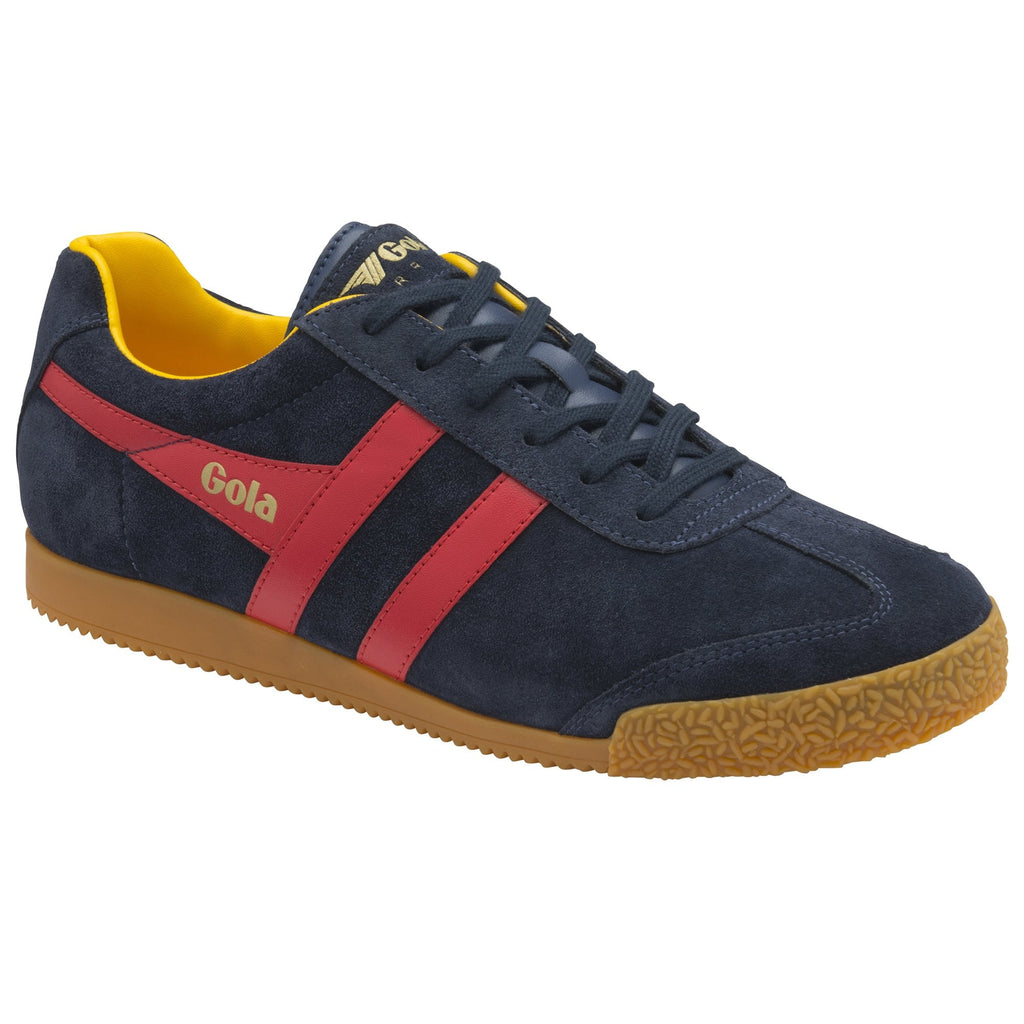 A Gola Harrier trainer in navy with red stripes, yellow lining, and a gum sole.