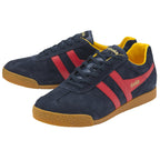 A pair of Gola Harrier trainers in navy with red stripes and yellow lining.
