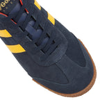Close-up of the toe and laces of a Gola Harrier suede trainer in navy with yellow stripes.