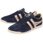 Pair of Gola Bullet trainers in navy suede with gold stripes and heel, angled view.