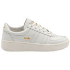Side profile of a white Gola sneaker with gold branding on a white background.