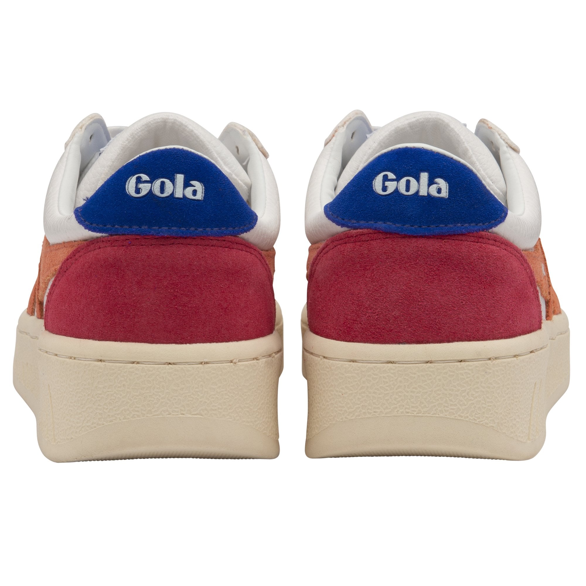 The back view of a pair of white Gola sneakers with red heels and blue Gola logos.