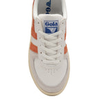 A top-down view of the front of a white Gola sneaker with orange stripes and a blue logo.
