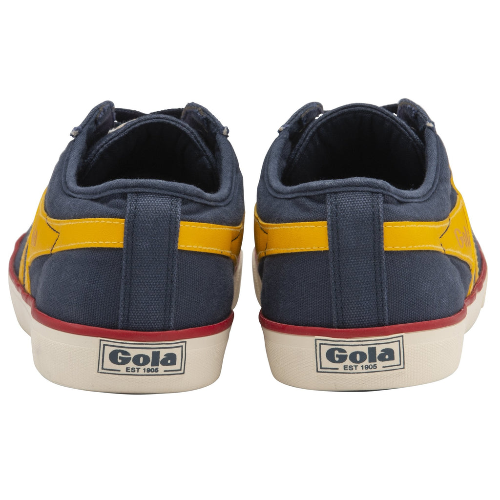 The back view of a pair of navy and yellow Gola sneakers on a white background.