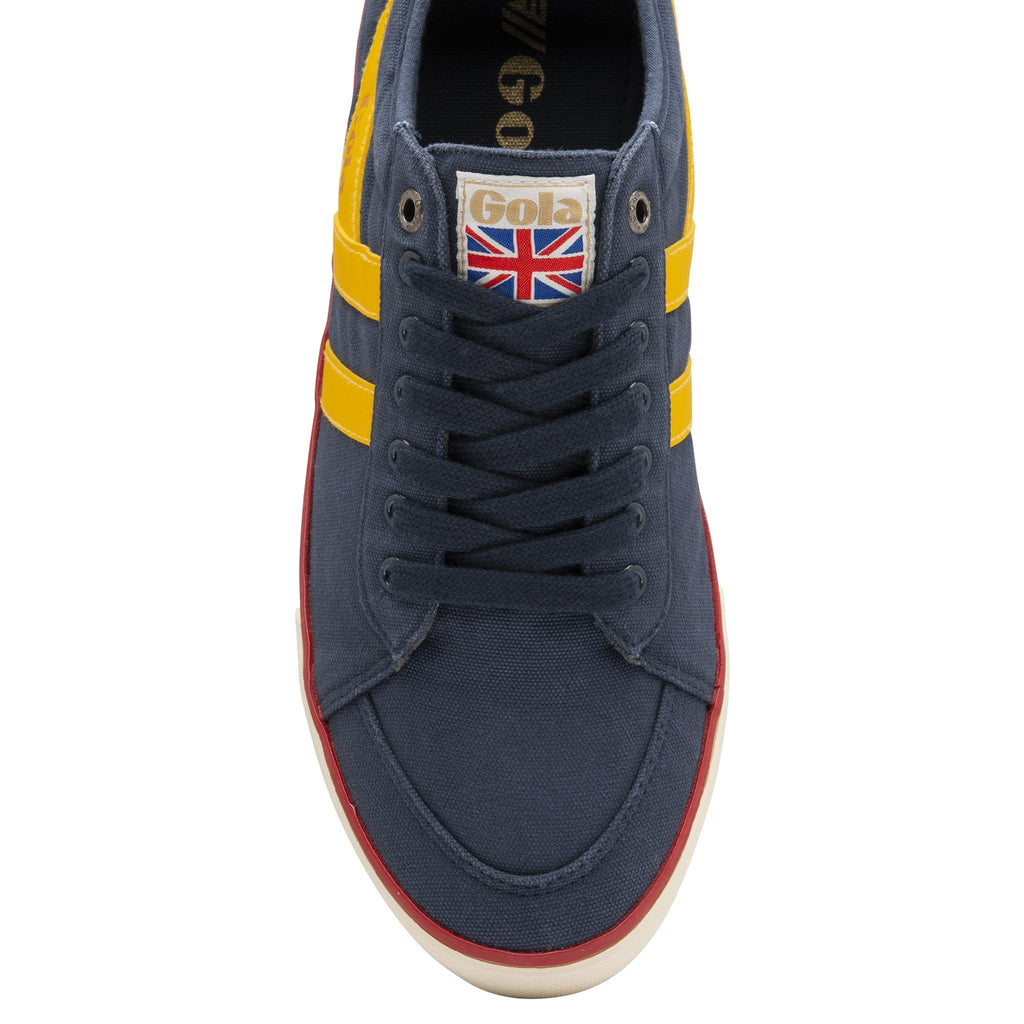 The top-down view of a navy and yellow Gola sneaker on a white background.