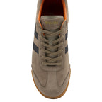 Top-down view of a single Gola men's khaki suede sneaker with navy stripes and orange accents.