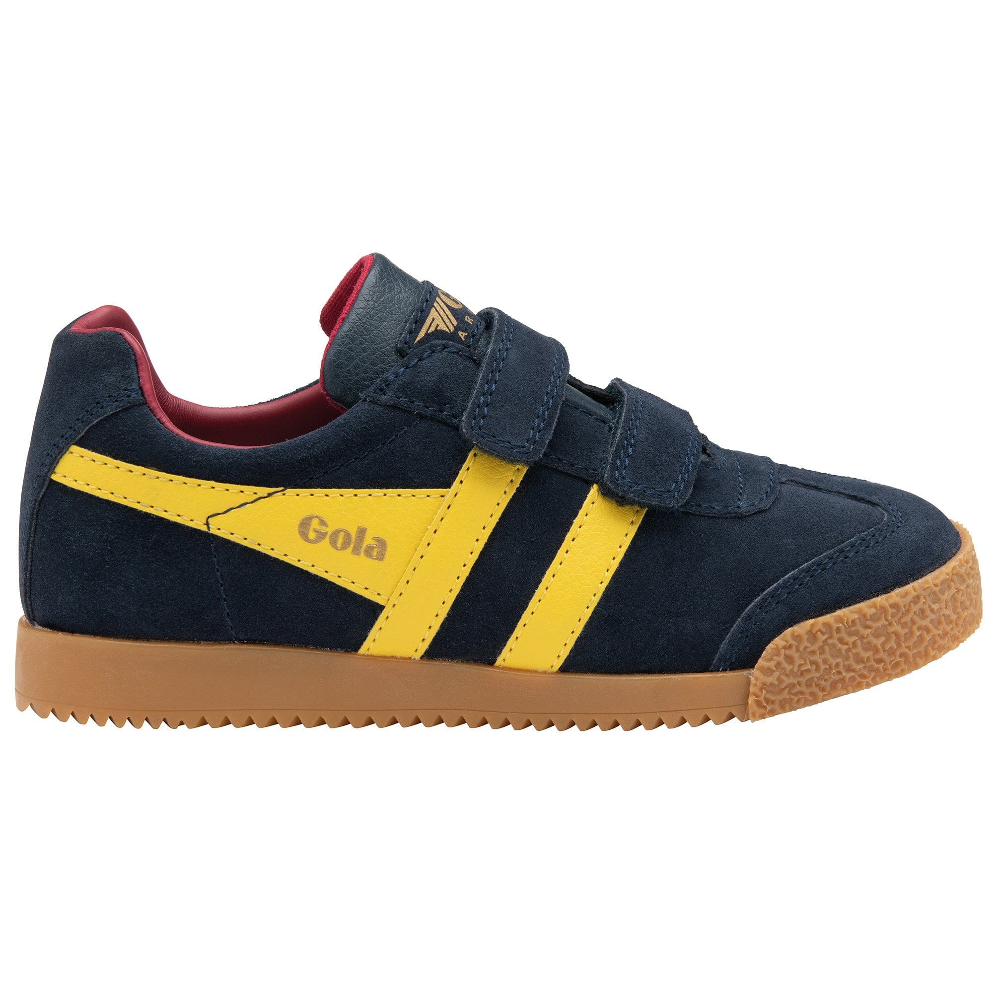 A navy blue Gola trainer with yellow stripes and velcro straps, viewed from the side.