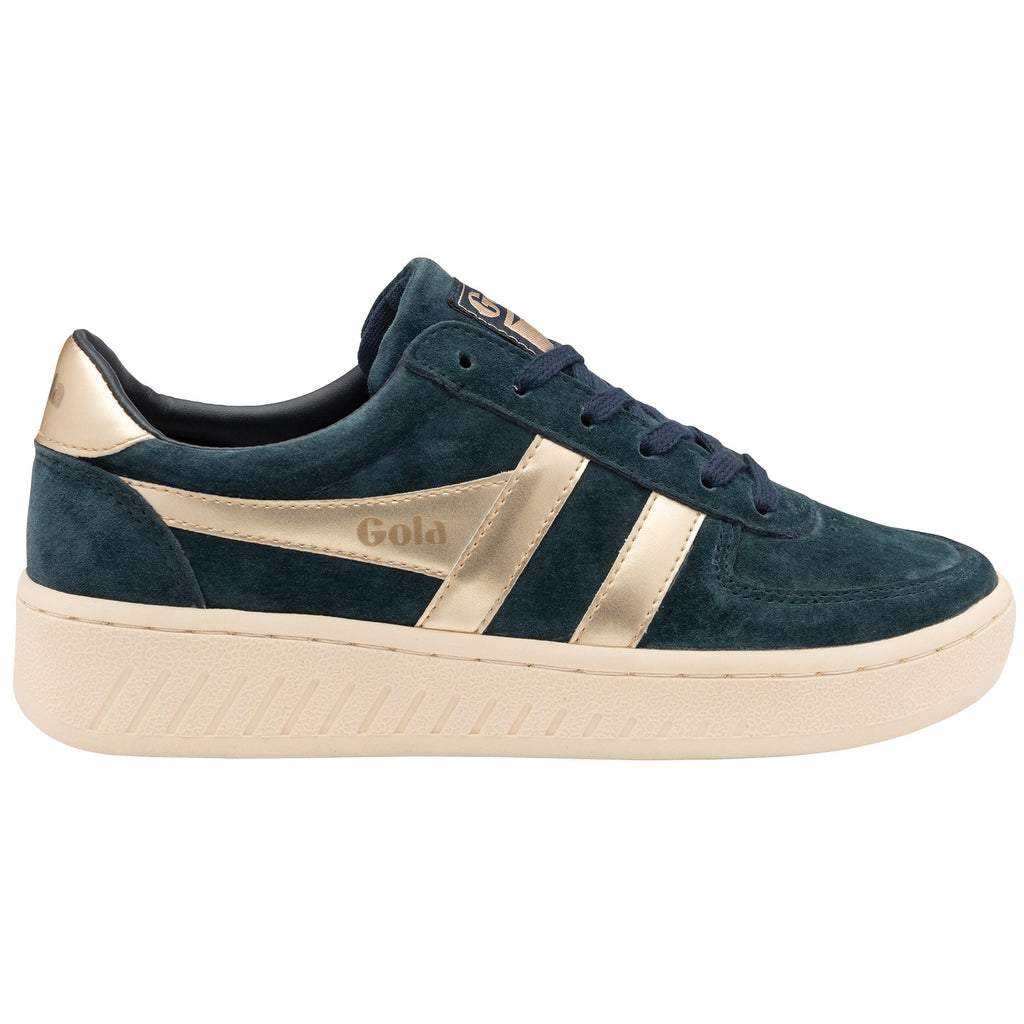 A single Gola women's low-top sneaker in navy with gold accents on a white background.