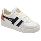 A white Gola sneaker with navy stripes and an orange heel, shown from a slight angle.