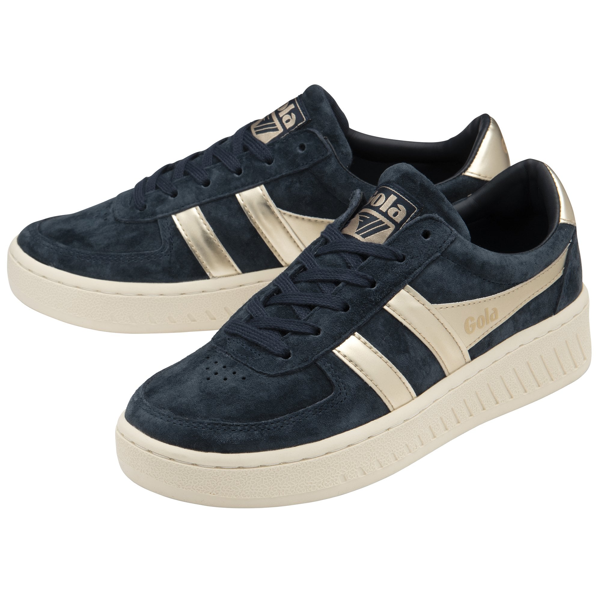 A pair of Gola women's low-top sneakers in navy with gold accents on a white background.