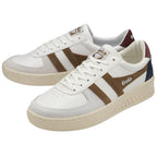 Two white Gola sneakers with brown and navy accents.