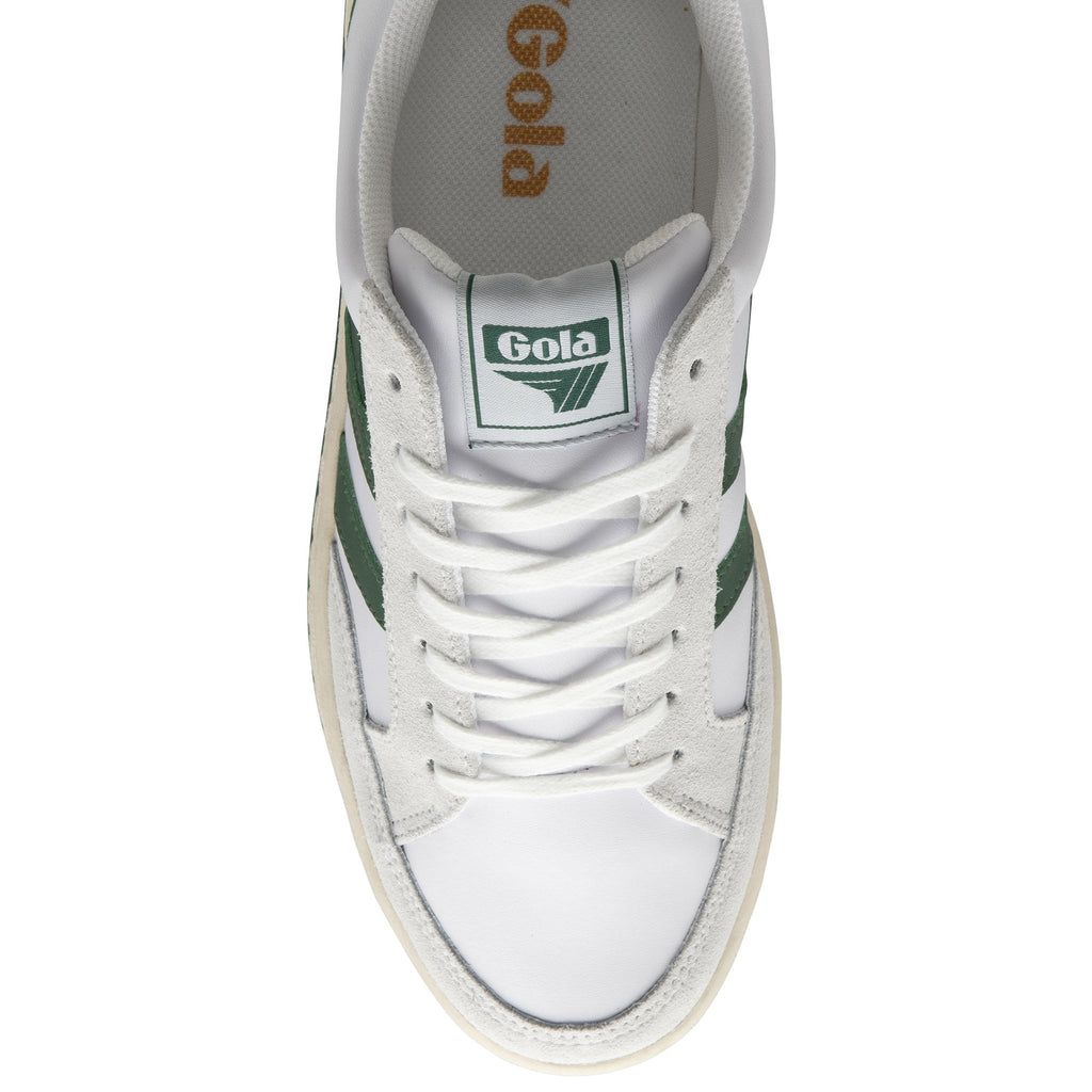 A single white and green Gola sneaker from above.