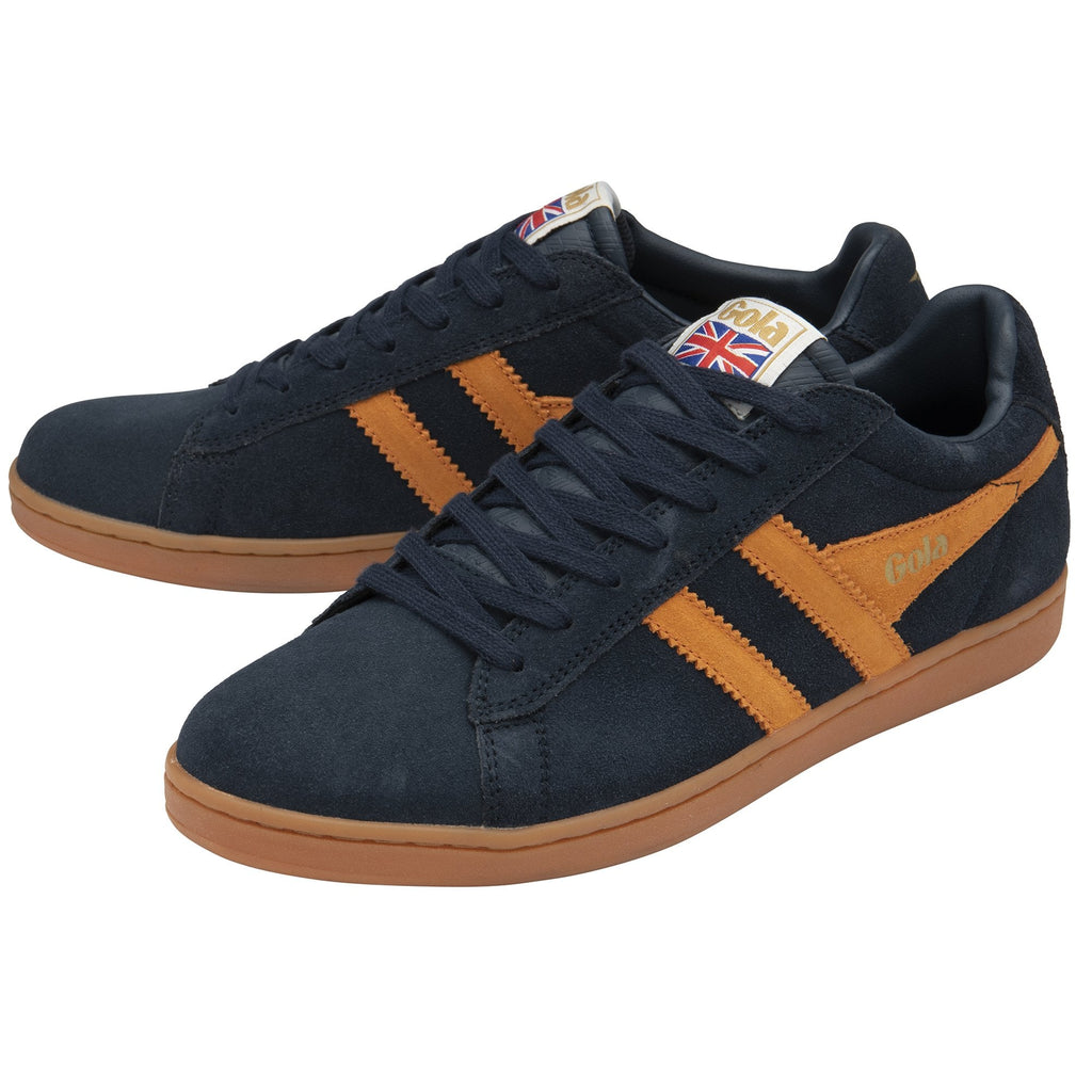Navy blue suede trainers with orange stripes and gum sole