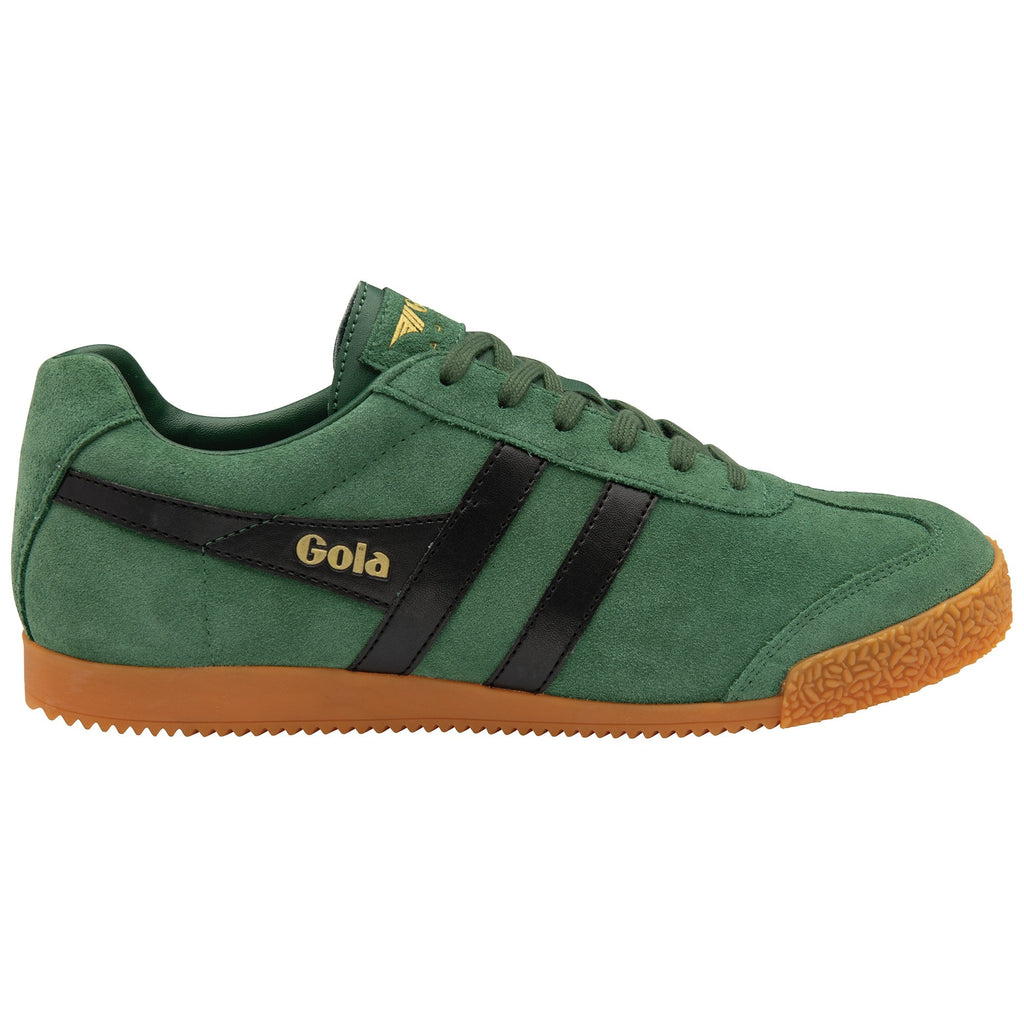 A close-up shot captures the Gola men's Harrier trainer in forest green, set against a white backdrop.