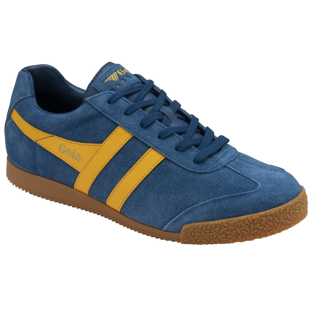 Angled view of a single blue and yellow Gola Harrier suede trainer on a white background.