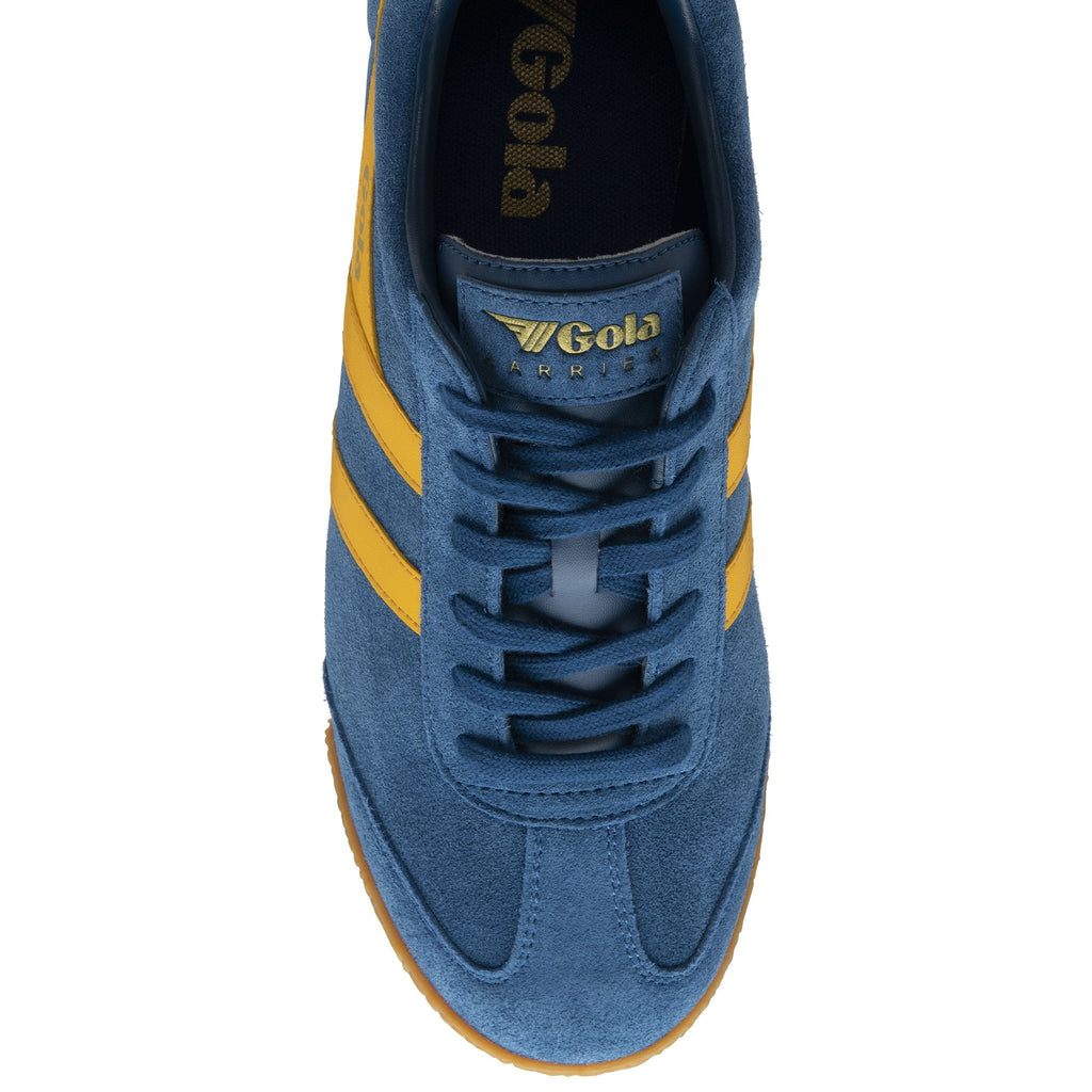 Top down view of a single blue and yellow Gola Harrier suede trainer on a white background.