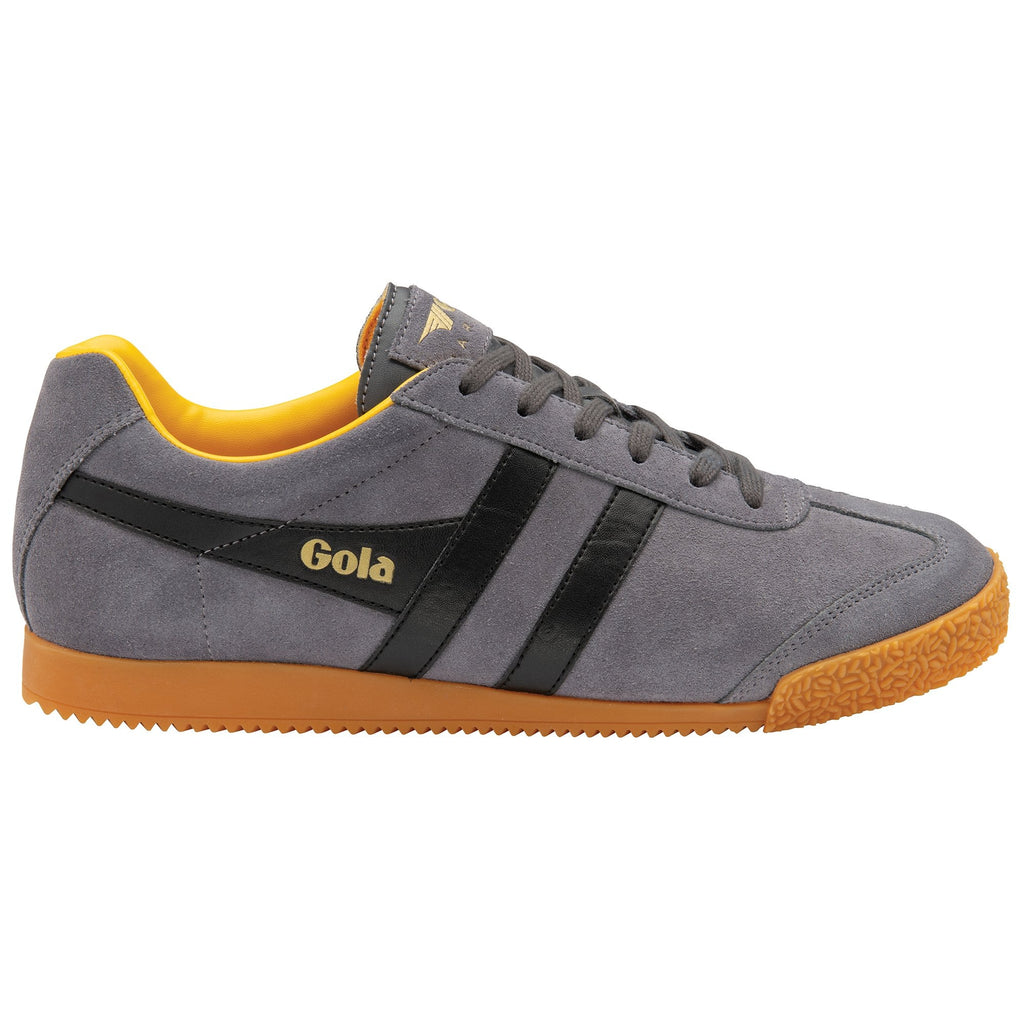A single gray suede Gola sneaker with black stripes and a yellow interior, facing right.