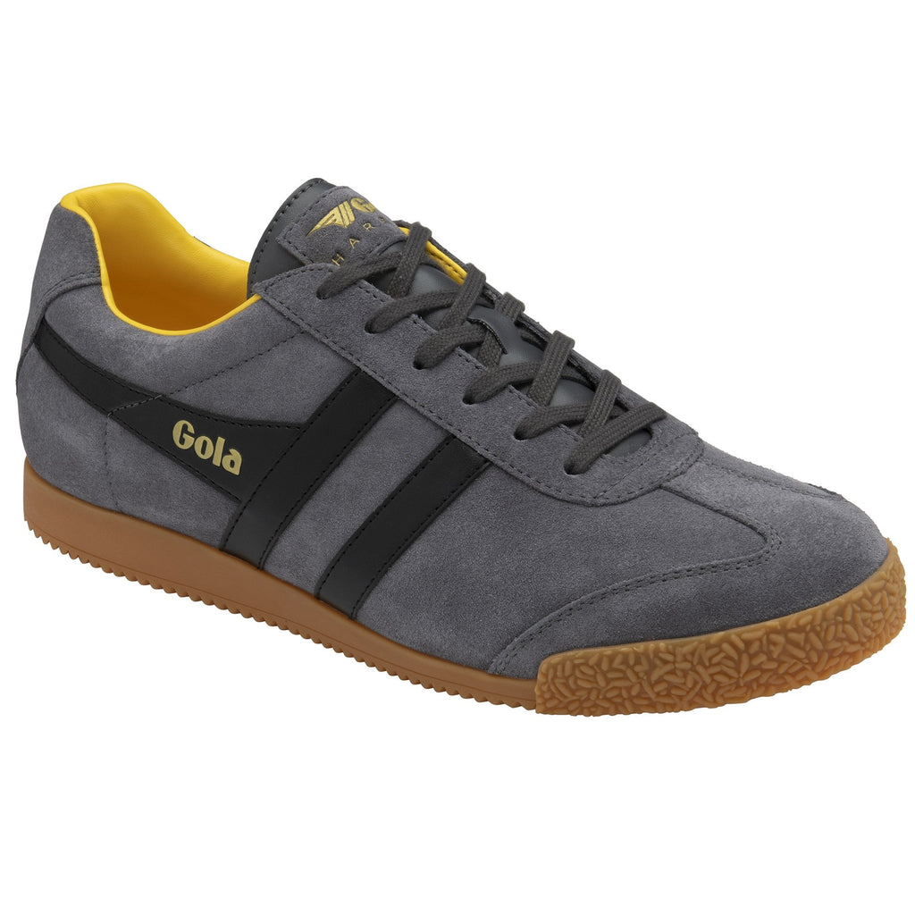 A single gray suede Gola sneaker with black stripes and a yellow interior, angled slightly.
