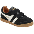 Black and white Gola trainer with Velcro straps and a brown sole, angled view.