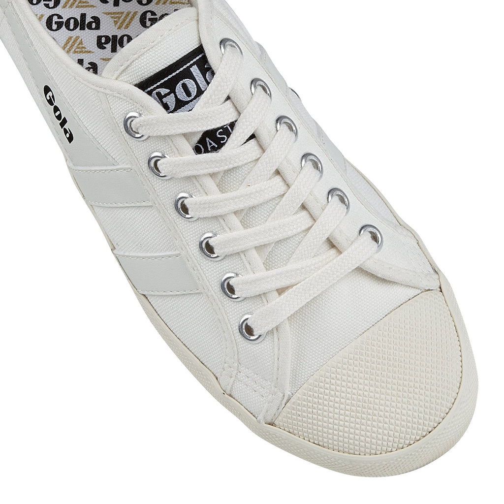 A close-up of the front of a white Gola Coaster shoe.