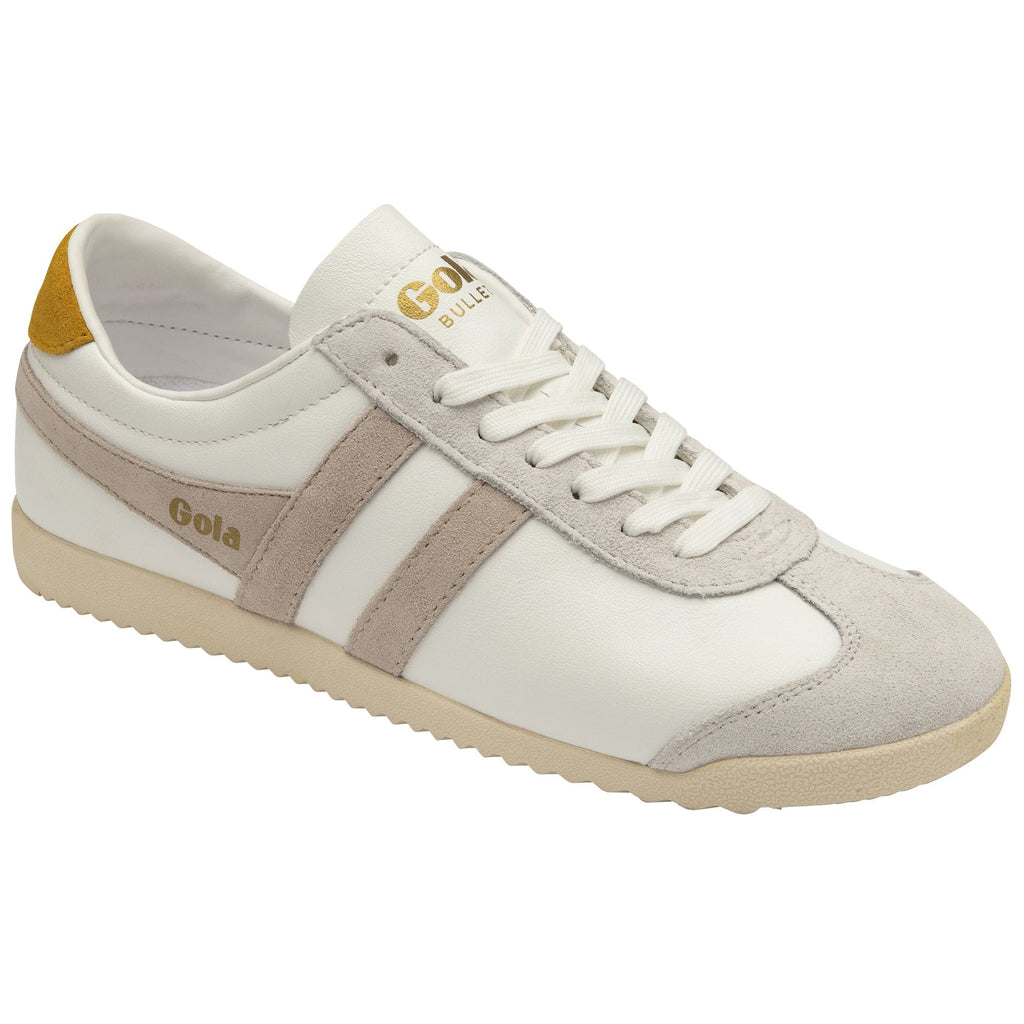A white and beige Gola Bullet sneaker with a gold heel tab, viewed from an angle.