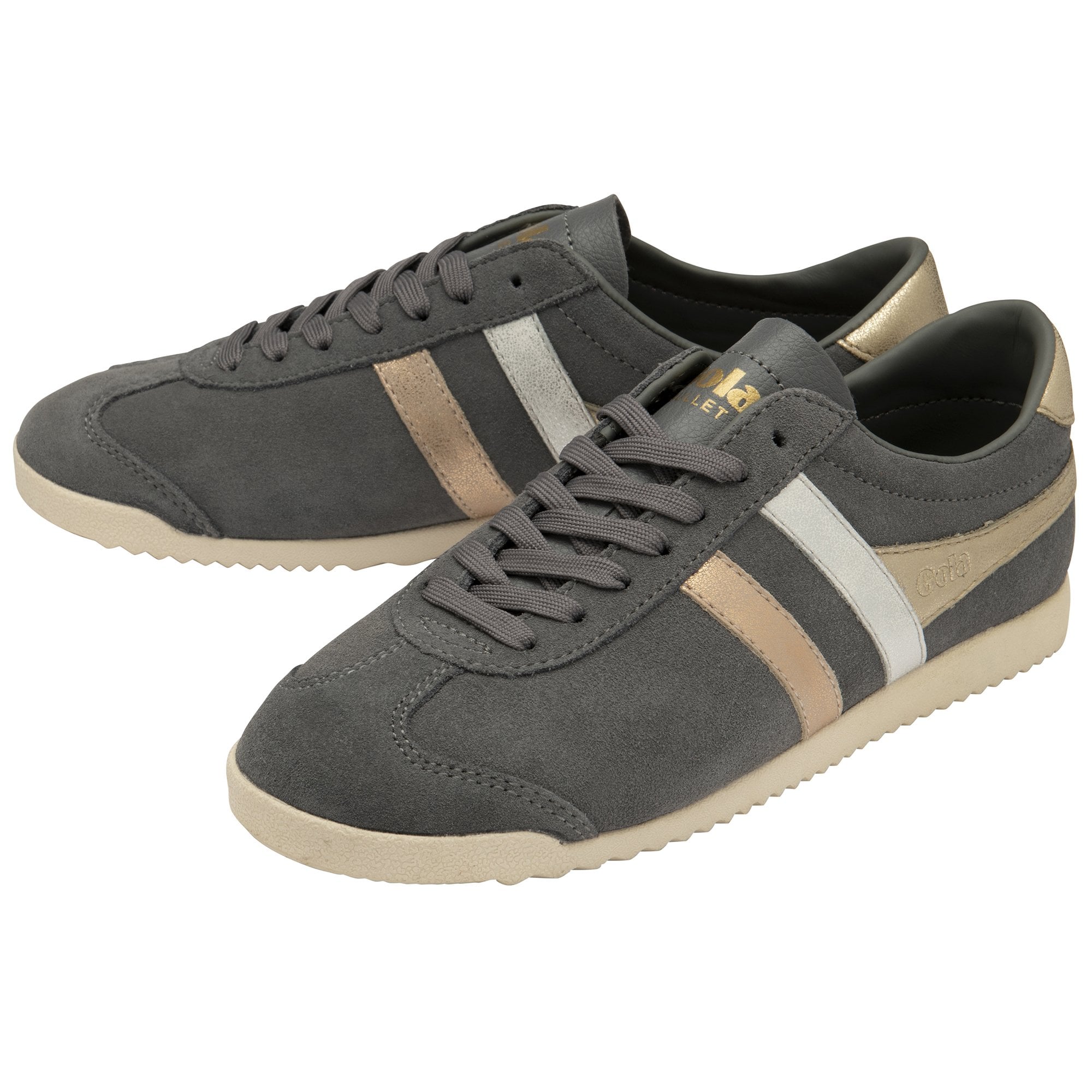 A pair of gray Gola Bullet trainers with gold, silver, and rose gold stripes.