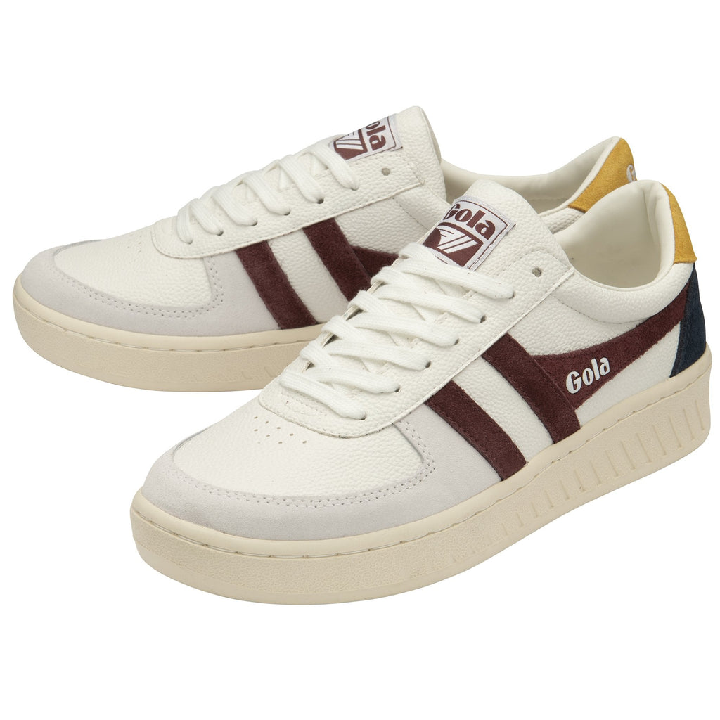 Pair of Gola men's sneakers in white, gold, navy, and burgundy, angled view.