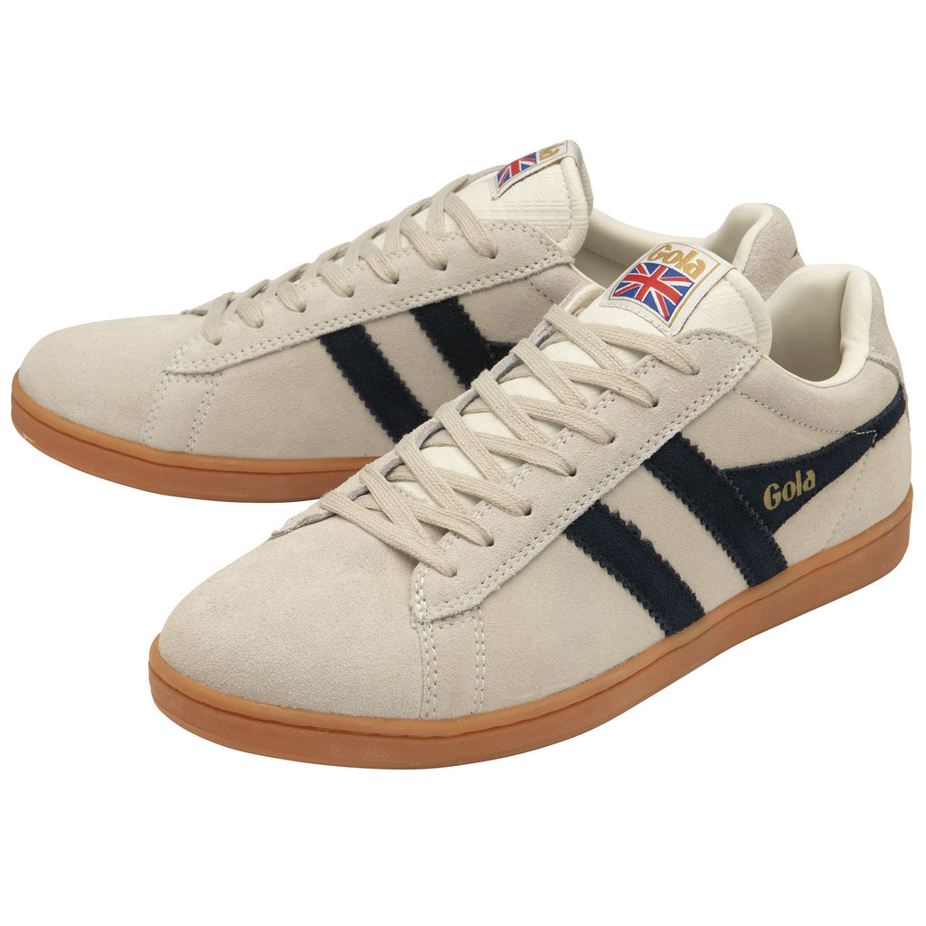 A pair of Gola low top sneakers, with the left shoe in front and the right shoe behind it.
