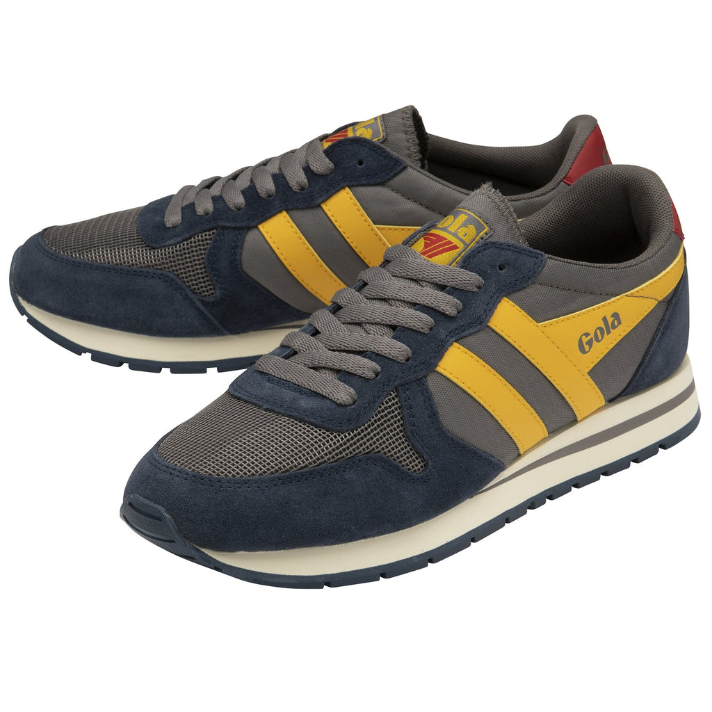 A pair of Gola Hurricane trainers in navy, grey, yellow, and red.