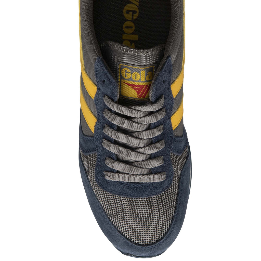 Top-down view of a single Gola Hurricane trainer in navy, grey, yellow, and red.