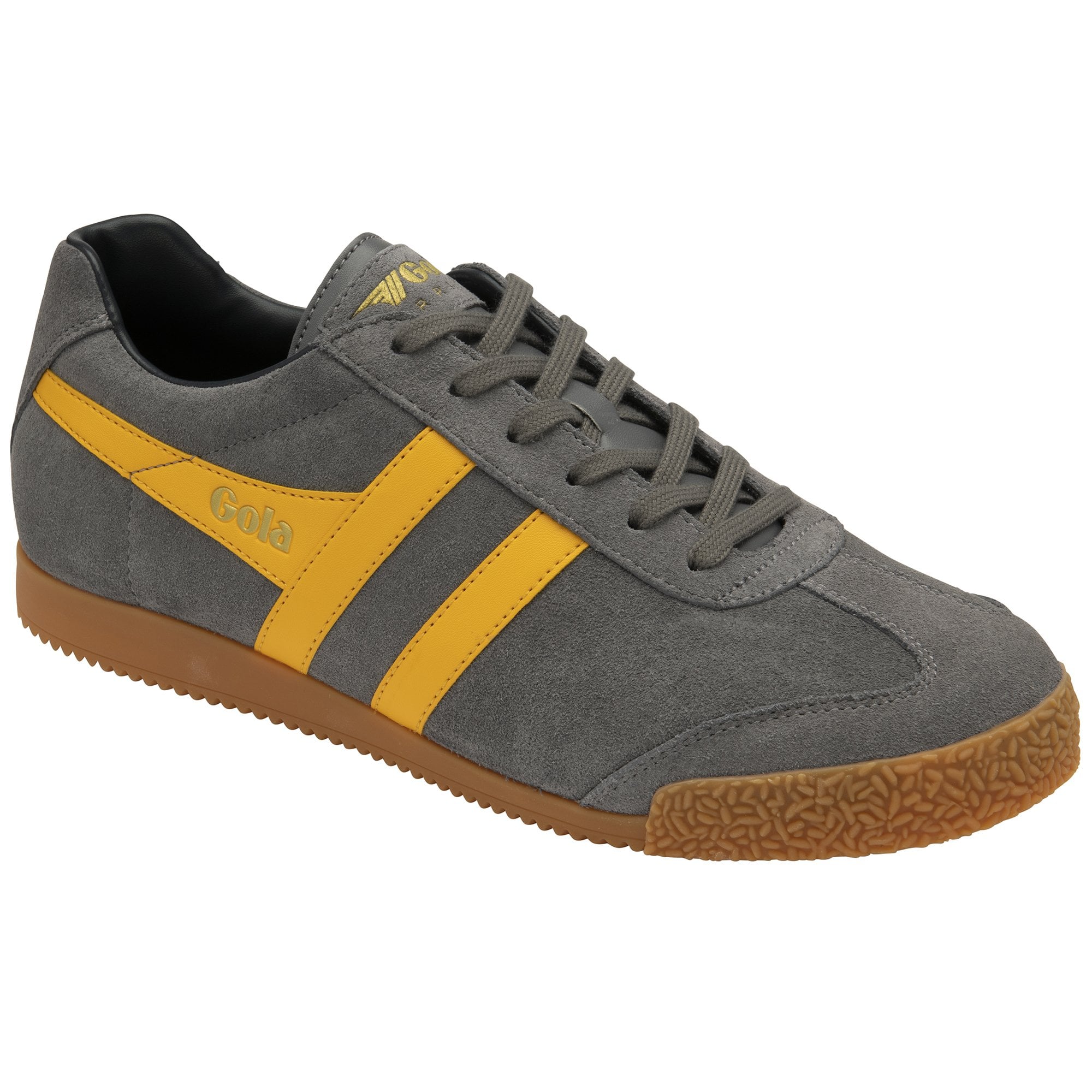 A left grey Gola Harrier shoe with yellow stripes on the side.